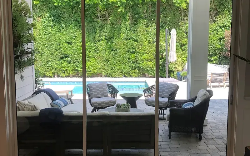 Residential sliders treated with film, the garden view completely unchanged.